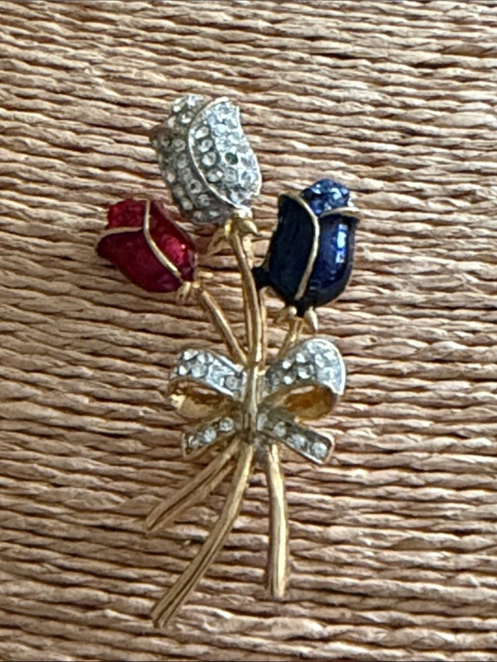Red white and blue crystal roses bouquet with a pave crystal bow brooch